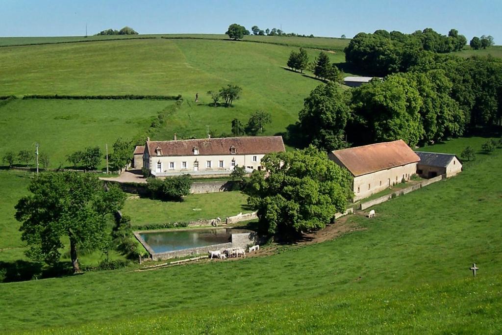 an aerial view of a large house in a field at Domaine de Drémont in Anthien