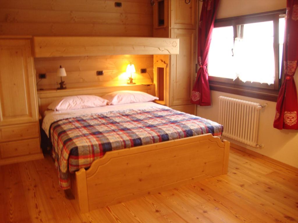 En eller flere senge i et værelse på Sot I Volz - locazione turistica