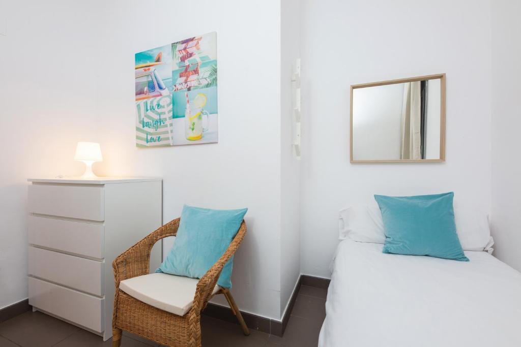 Postel nebo postele na pokoji v ubytování Apartamentos Cornellalux