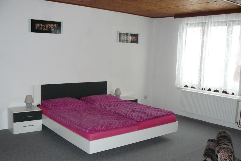 Postel nebo postele na pokoji v ubytování Apartmán U paní Věrky