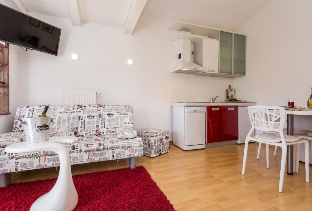 Kuchyň nebo kuchyňský kout v ubytování Molnar Resort Apartment Ljiljana