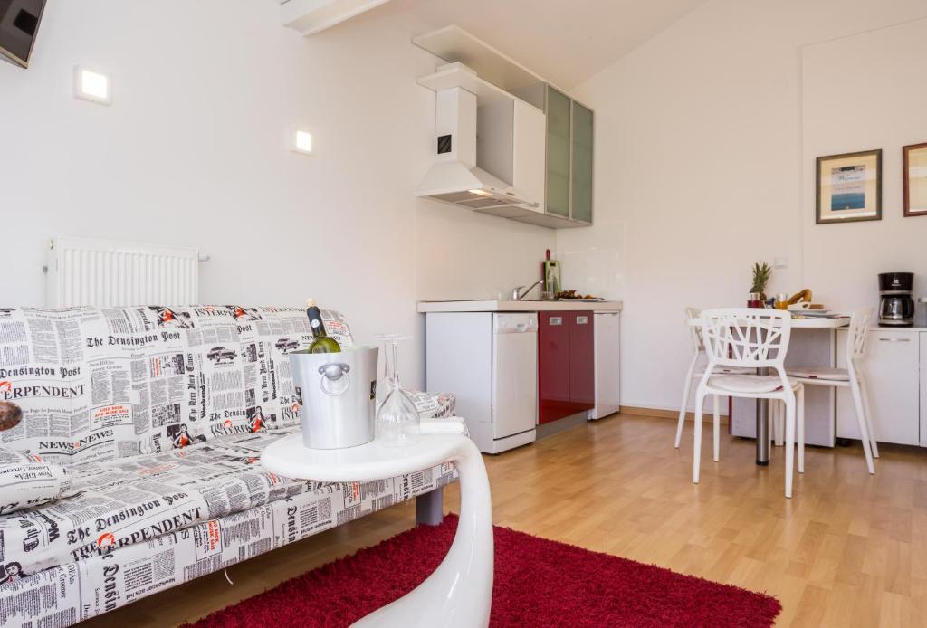 Kuchyň nebo kuchyňský kout v ubytování Molnar Resort Apartment Ljiljana