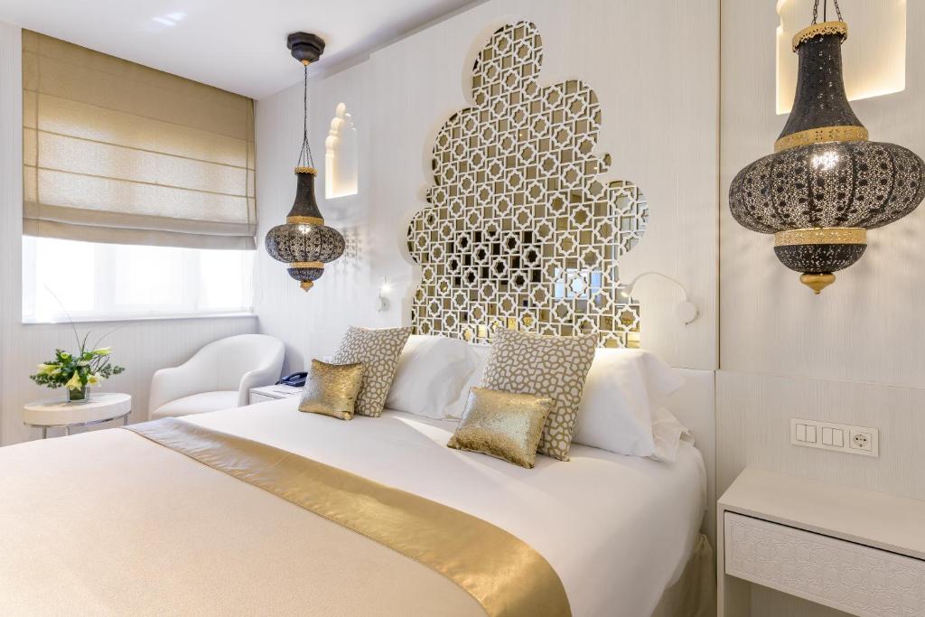 Postel nebo postele na pokoji v ubytování Hotel Saray