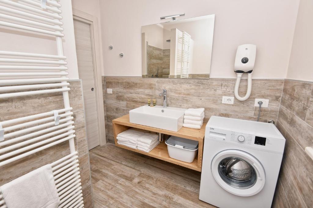 Kúpeľňa v ubytovaní Verdeulivo Relax Home - Ruculì Hospitality
