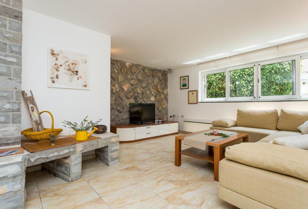 Posezení v ubytování Molnar Resort Apartment Sergej