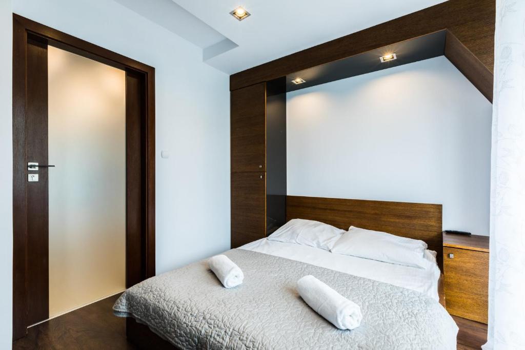 Posteľ alebo postele v izbe v ubytovaní Apartament Levante