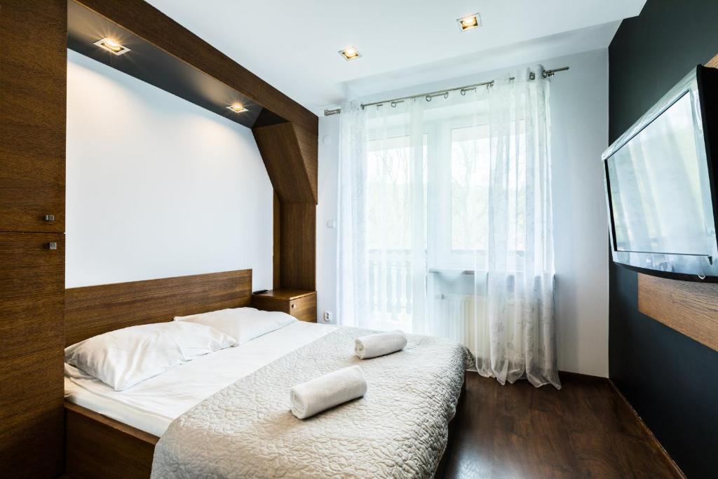 Posteľ alebo postele v izbe v ubytovaní Apartament Levante