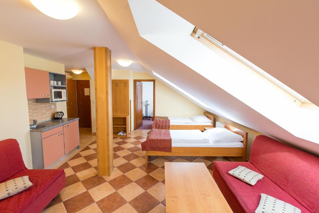Postel nebo postele na pokoji v ubytování Hotel Admiral