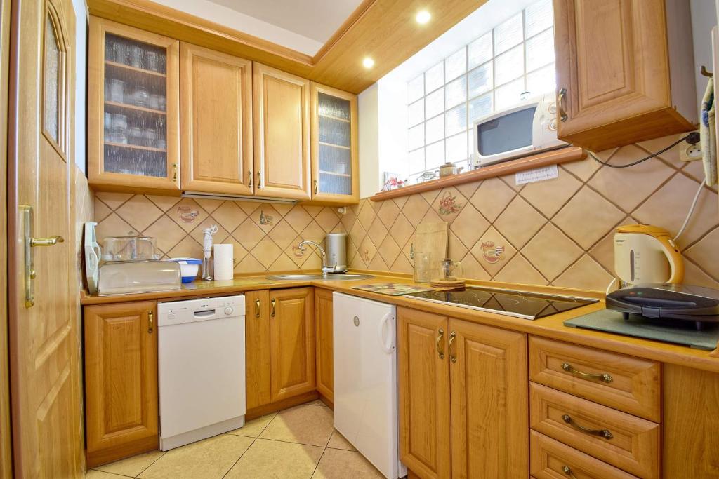 Kuchnia lub aneks kuchenny w obiekcie Apartament Zuzia