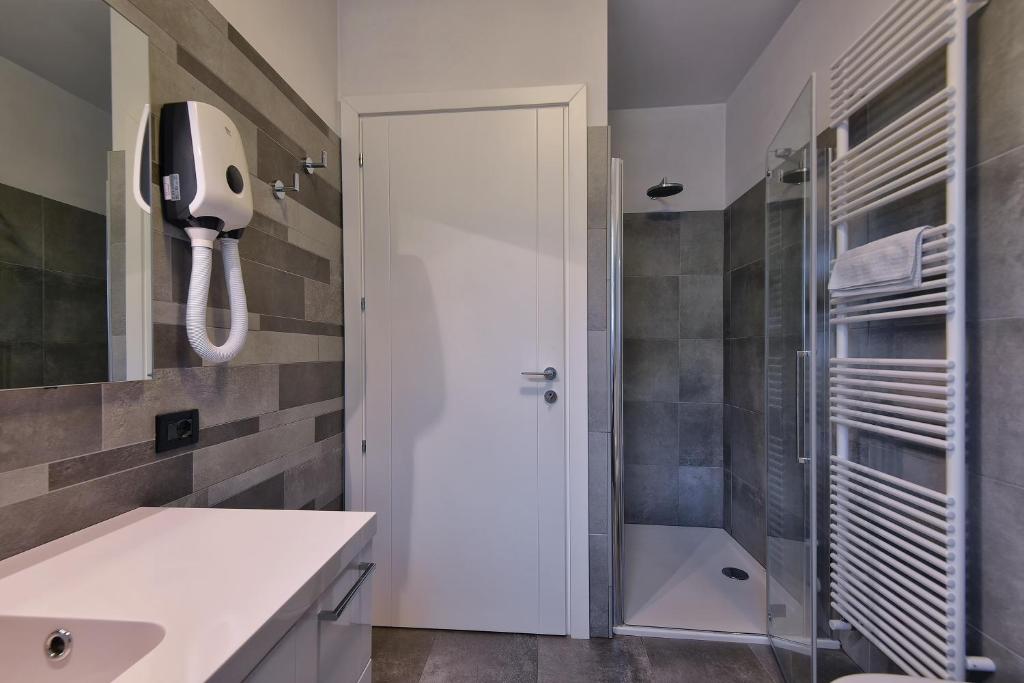 Koupelna v ubytování Les Maisons - Ruculì Hospitality