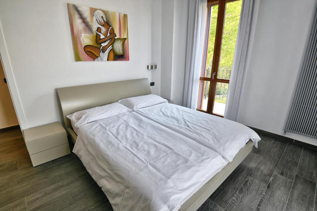 Postel nebo postele na pokoji v ubytování Les Maisons - Ruculì Hospitality