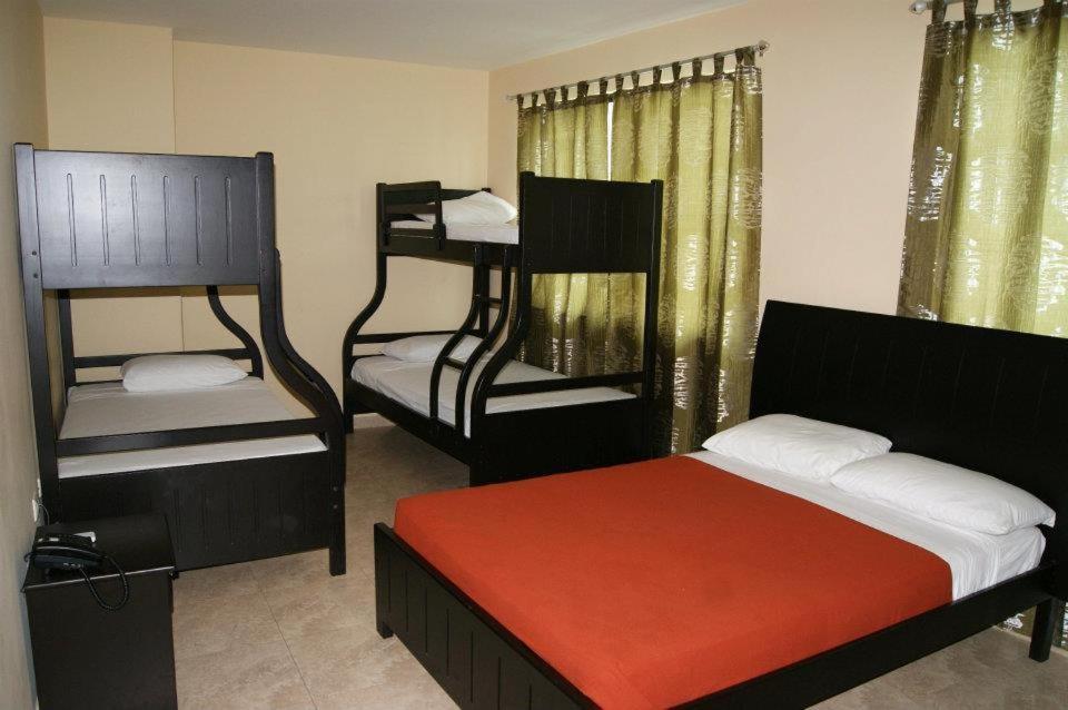 Postel nebo postele na pokoji v ubytování Hotel Marvento II
