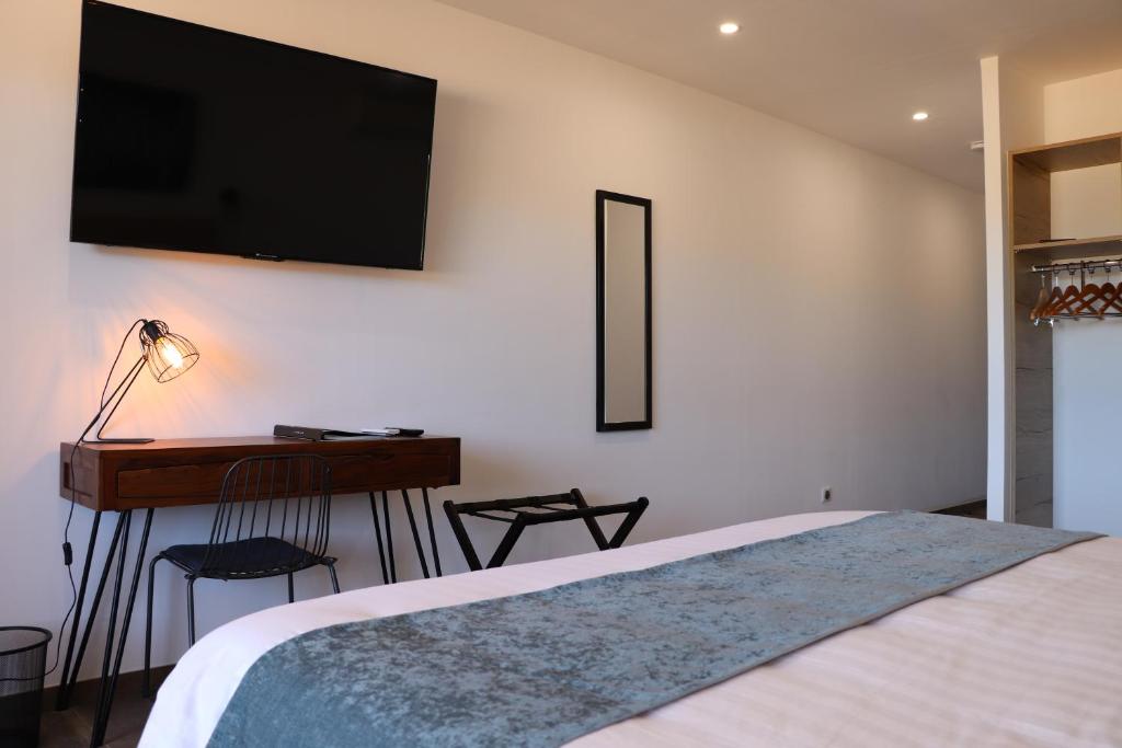Postel nebo postele na pokoji v ubytování Hotel Fazio
