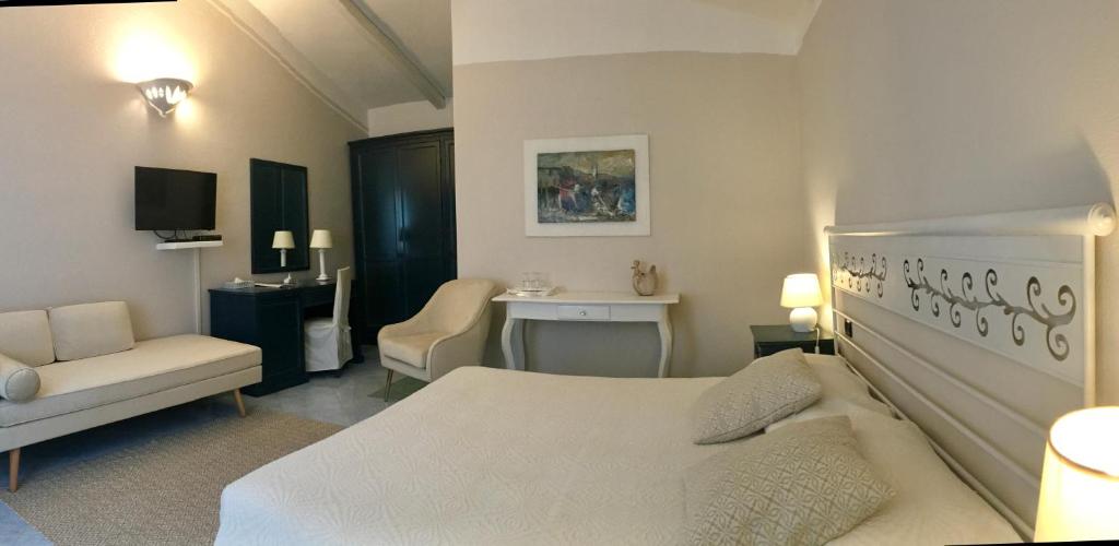 Postel nebo postele na pokoji v ubytování Hotel Su Lithu