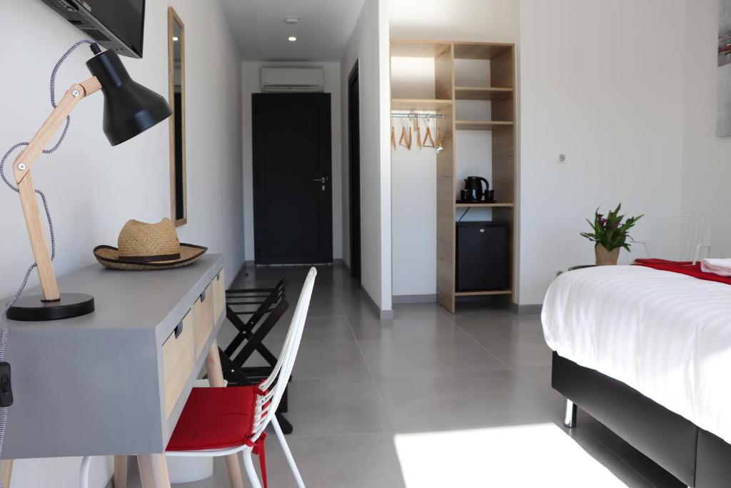 Postel nebo postele na pokoji v ubytování Hotel Fazio