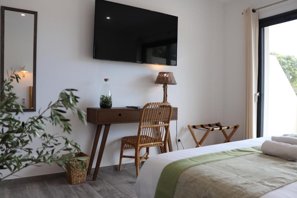 Postel nebo postele na pokoji v ubytování Hotel Fazio