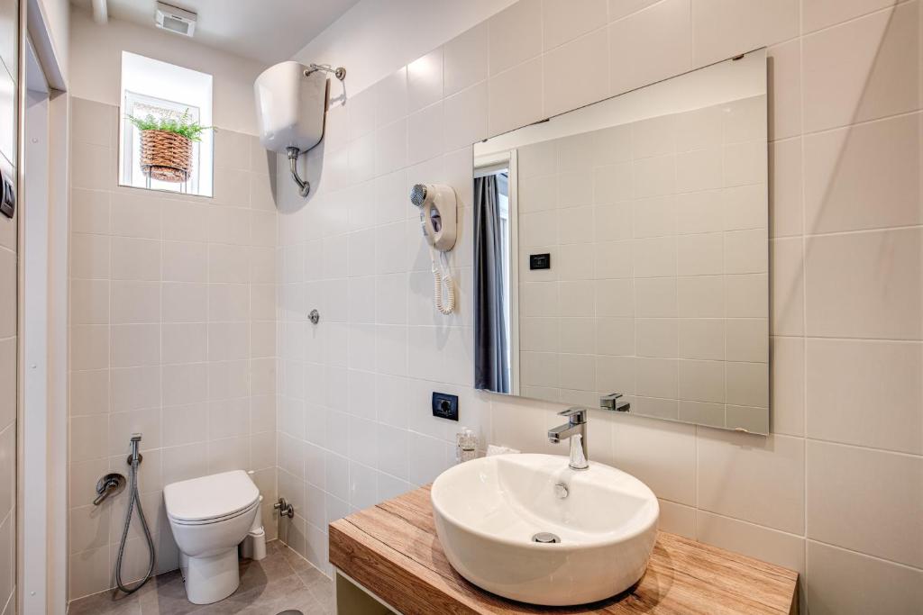 Koupelna v ubytování Hotel King