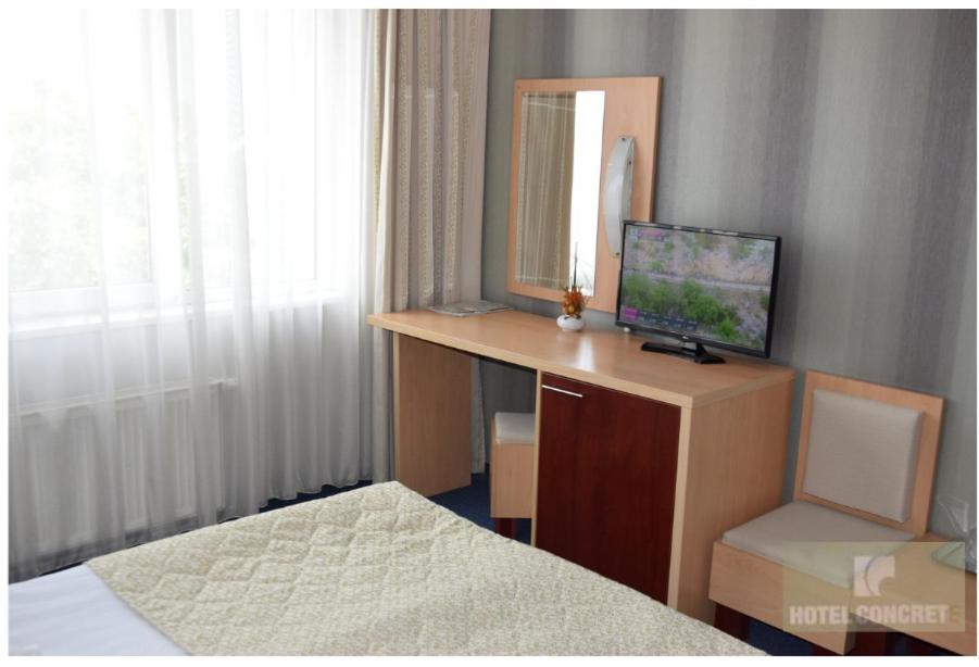 TV a/nebo společenská místnost v ubytování Hotel Concrete