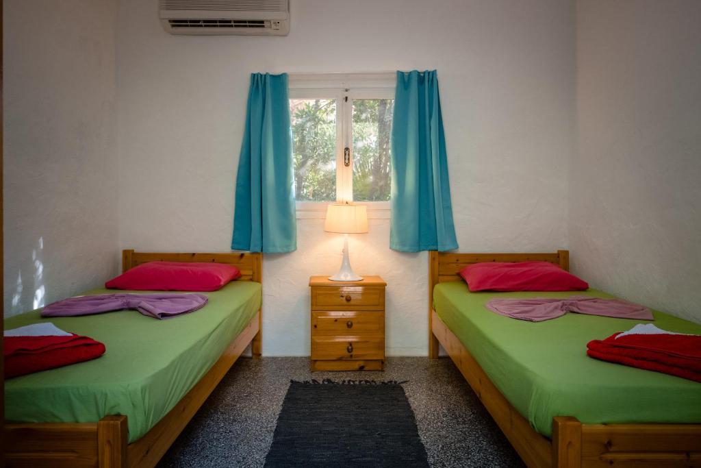 Postel nebo postele na pokoji v ubytování Camping Elizabeth