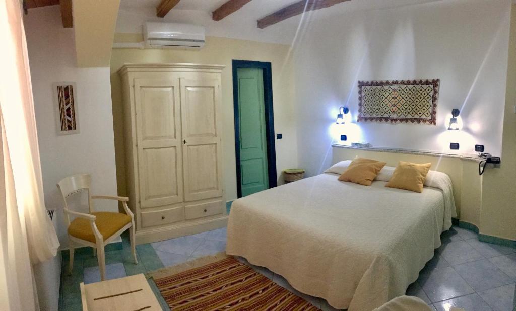 Postel nebo postele na pokoji v ubytování Hotel Su Lithu