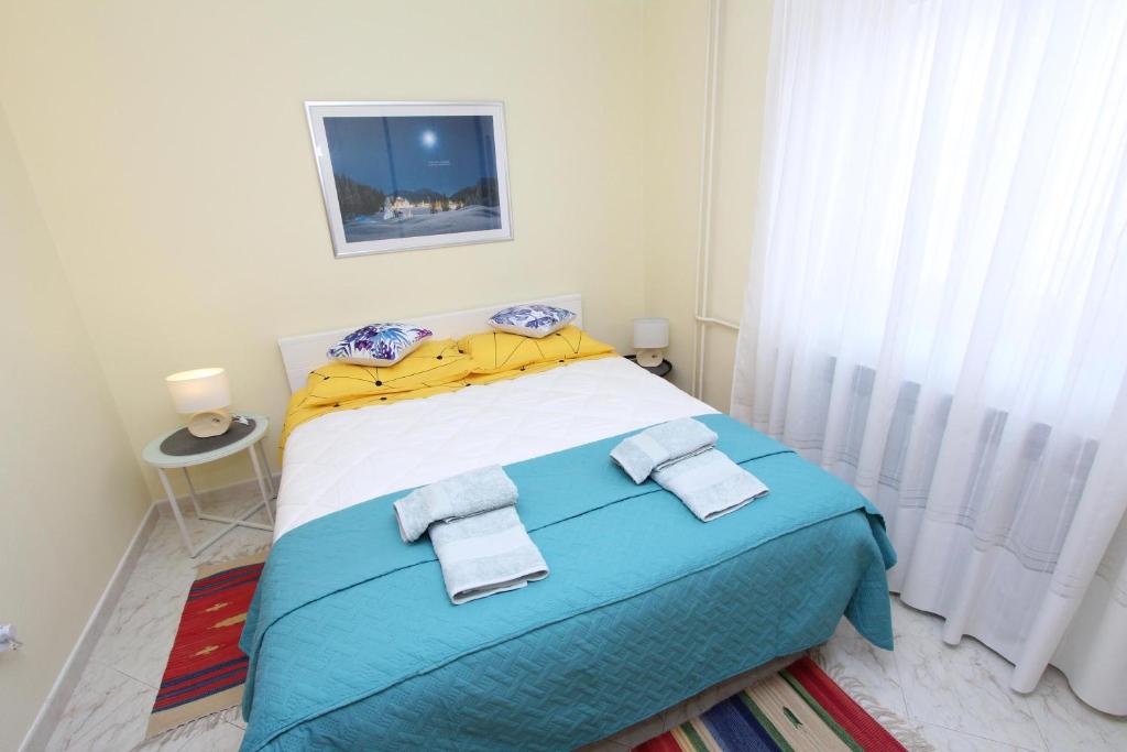 Posteľ alebo postele v izbe v ubytovaní Apartment Amabile