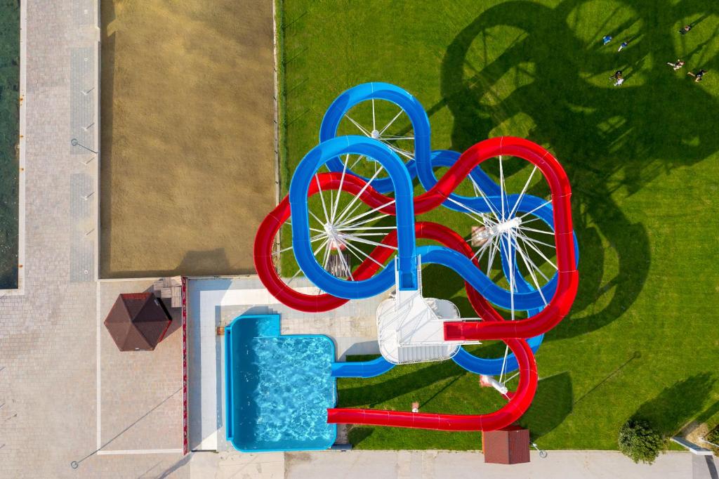 an aerial view of a water park with a play structure at Dependences - San Simon Resort in Izola