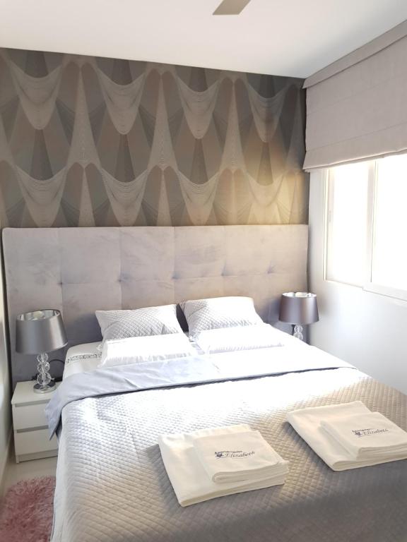 Posteľ alebo postele v izbe v ubytovaní Apartamento Elizabeth
