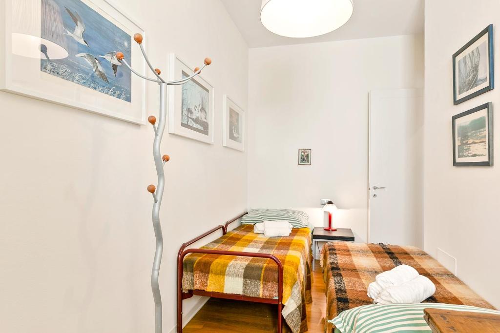 Posteľ alebo postele v izbe v ubytovaní Flat in the heart of Pisa