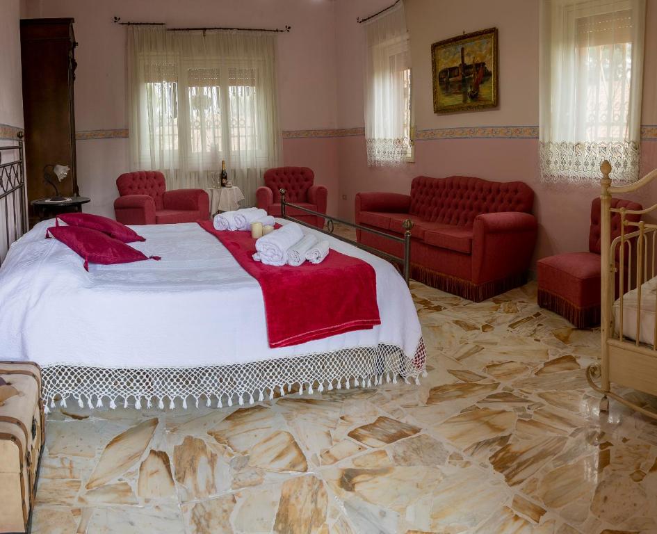 Łóżko lub łóżka w pokoju w obiekcie Casa vacanze Gioia