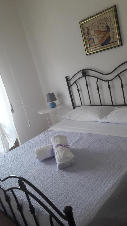 Postel nebo postele na pokoji v ubytování Villa Midolo