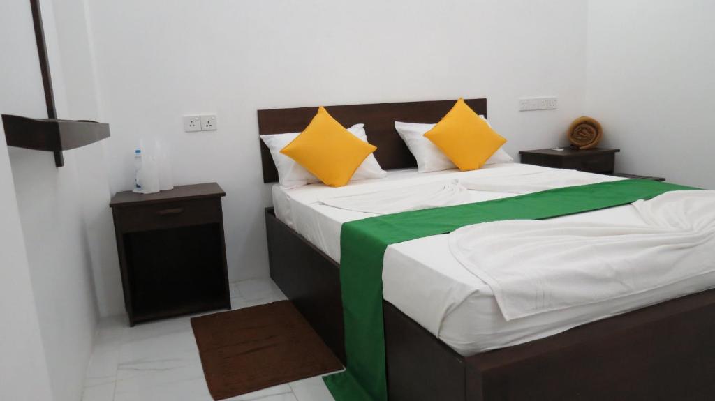Postel nebo postele na pokoji v ubytování Senomaal Sigiri Resort