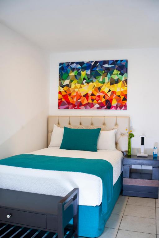 Postel nebo postele na pokoji v ubytování Container Inn Hotel Aeropuerto