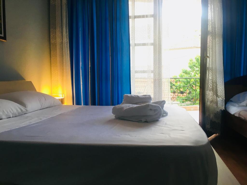 Postel nebo postele na pokoji v ubytování ODA Guest House