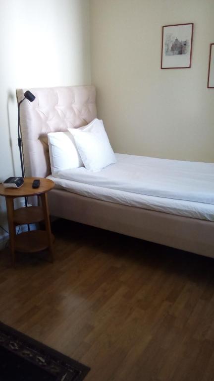 Postel nebo postele na pokoji v ubytování Hotell S:t Olof