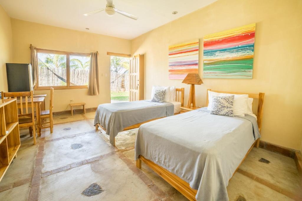 Postel nebo postele na pokoji v ubytování Hotel Santa Catalina Panamá