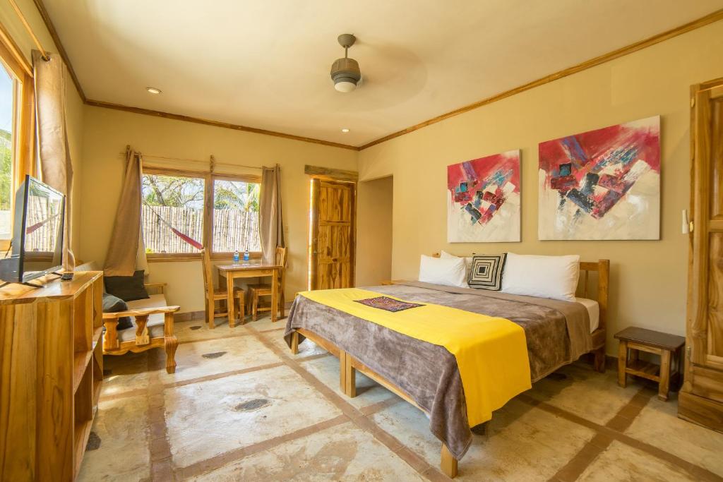 Postel nebo postele na pokoji v ubytování Hotel Santa Catalina Panamá
