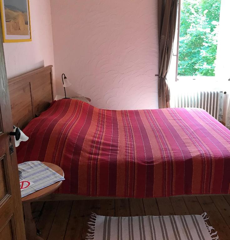 Postel nebo postele na pokoji v ubytování Le Ribet