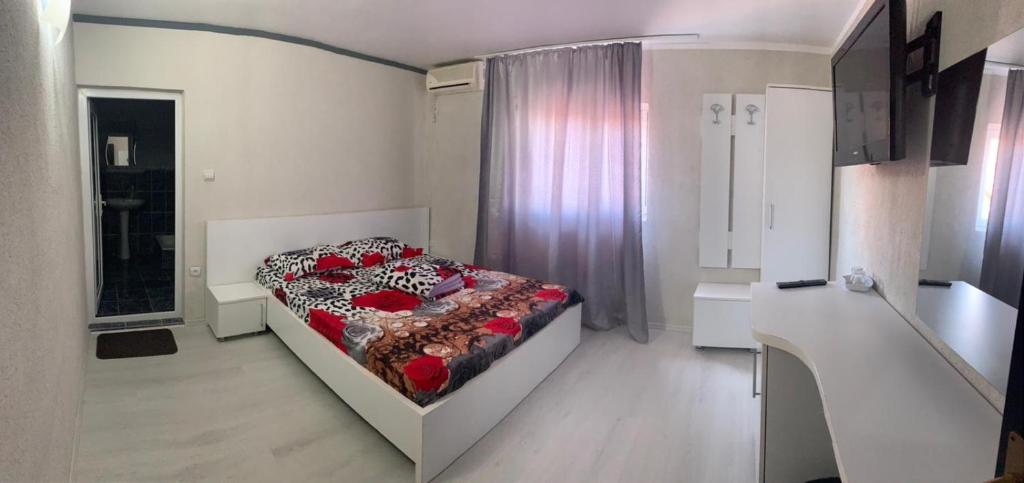 Postel nebo postele na pokoji v ubytování Casa Athena