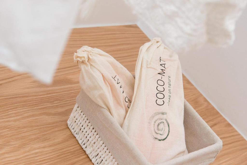 a bag sitting on top of a table at Hotel Villa Natassa in Skala Rachoniou