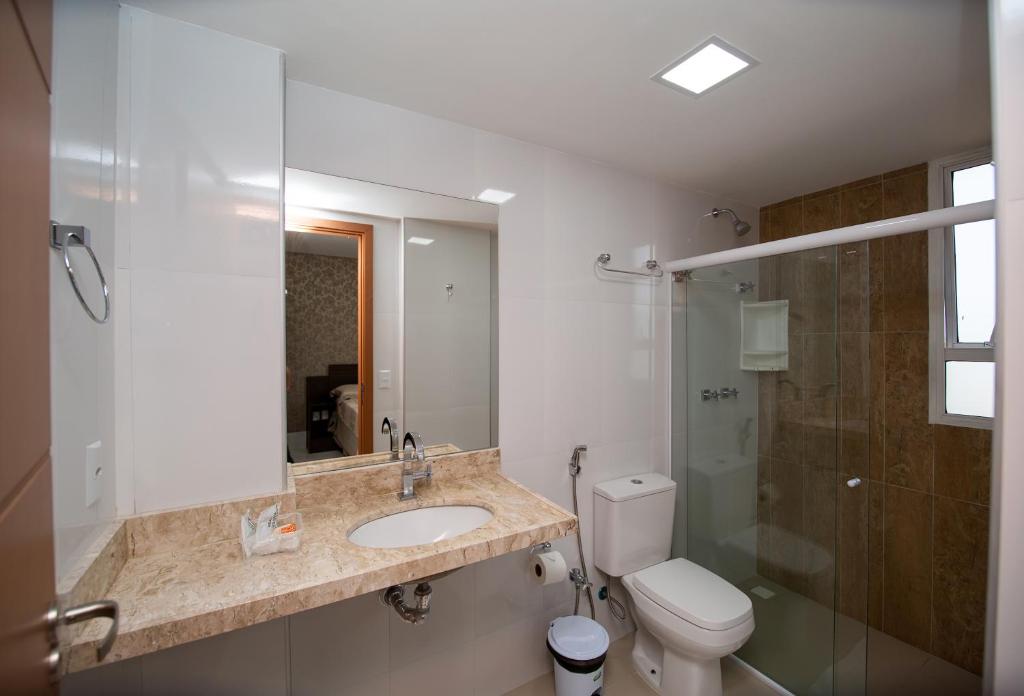 Um banheiro em Tambau Beach Hotel