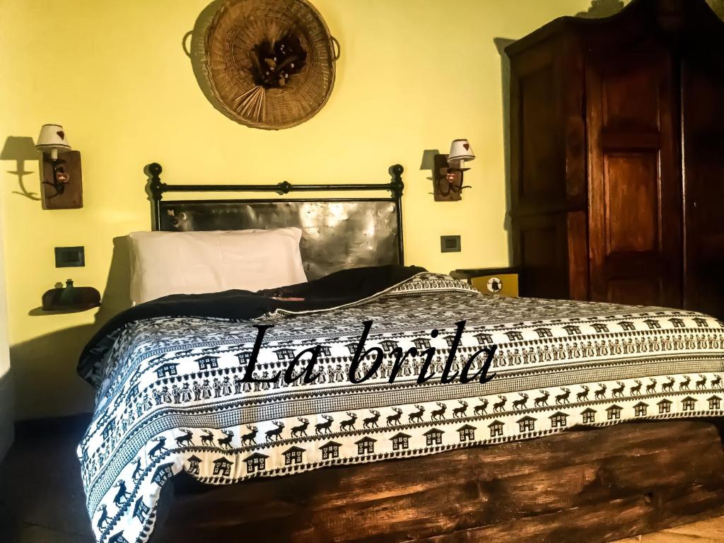 Postel nebo postele na pokoji v ubytování Agriturismo B&B Chèvres à Cheval