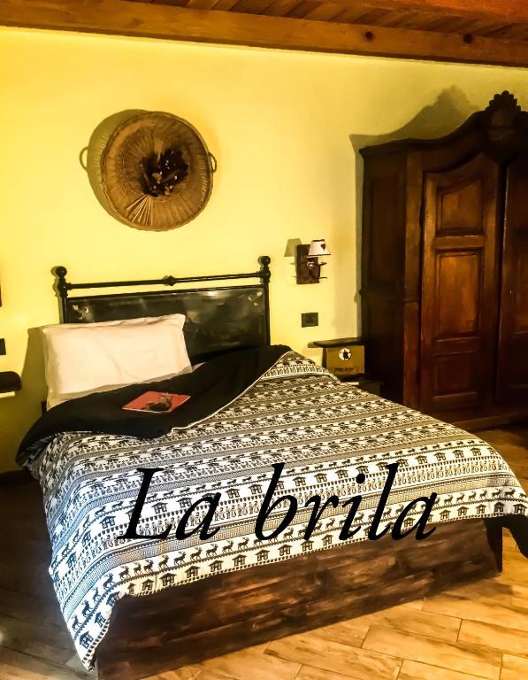 Postel nebo postele na pokoji v ubytování Agriturismo B&B Chèvres à Cheval