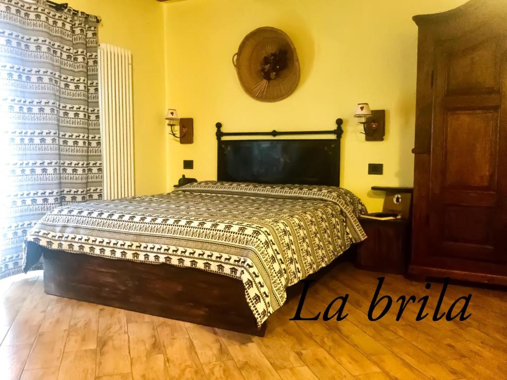Postel nebo postele na pokoji v ubytování Agriturismo B&B Chèvres à Cheval
