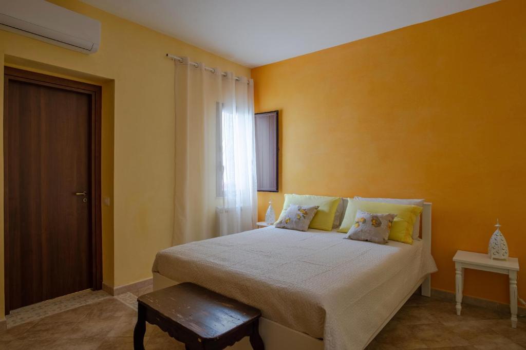 Postel nebo postele na pokoji v ubytování LUMIE DI SICILIA