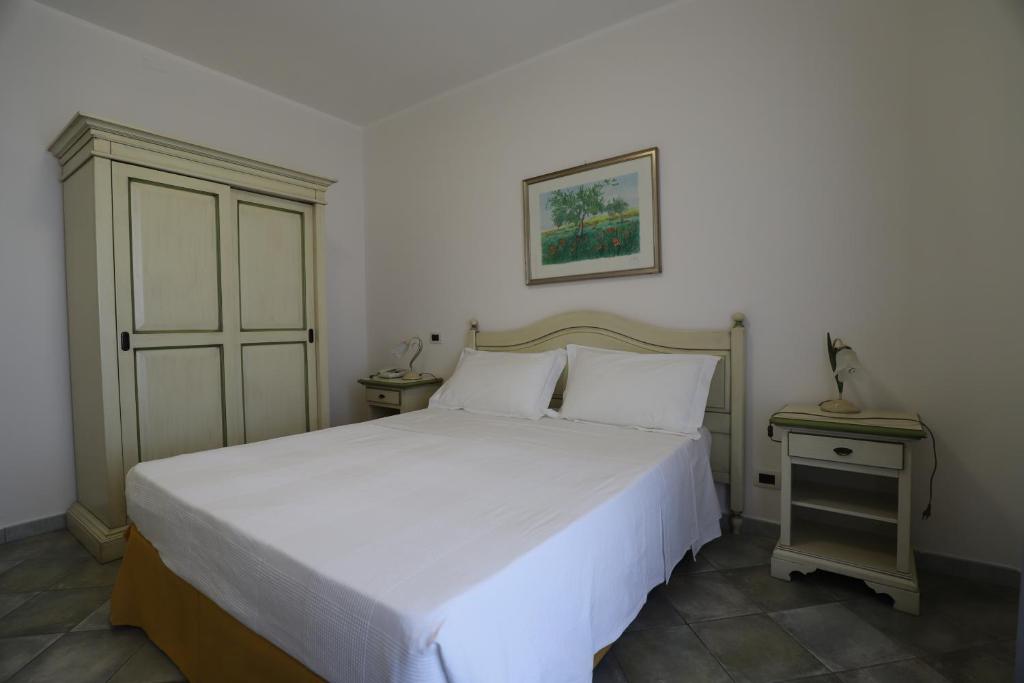 Letto o letti in una camera di Hotel Celeste