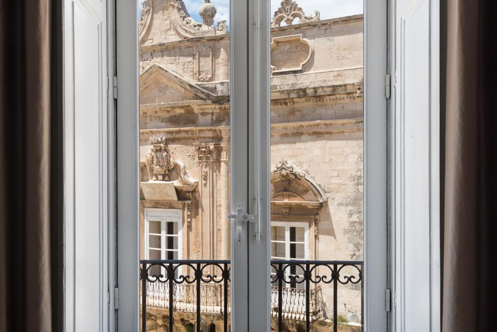 Balkón nebo terasa v ubytování D-Home Ortigia