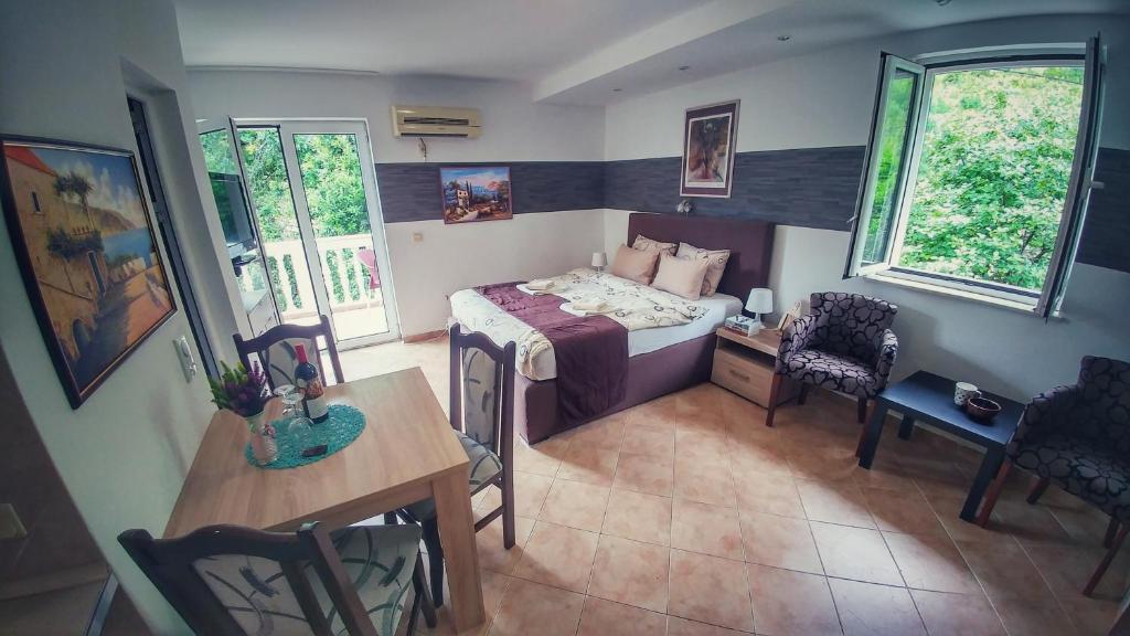 Кровать или кровати в номере Apartments Villa PM