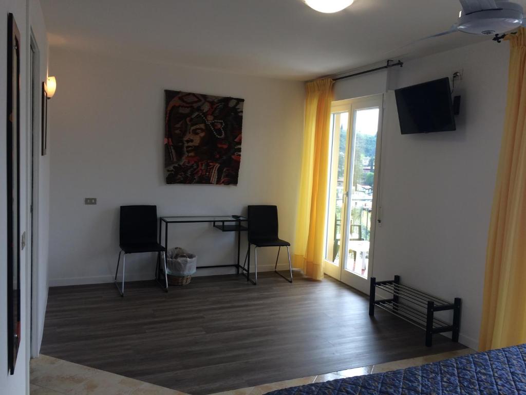 TV a/nebo společenská místnost v ubytování Hotel Casa Popi