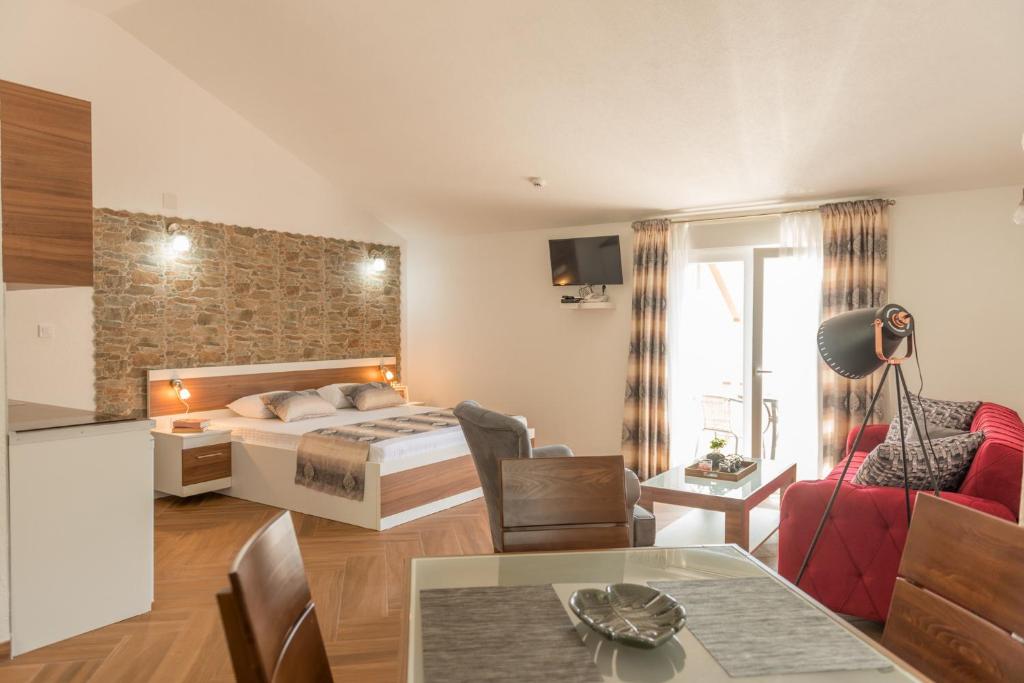 Posteľ alebo postele v izbe v ubytovaní Apartments Stella del Mare