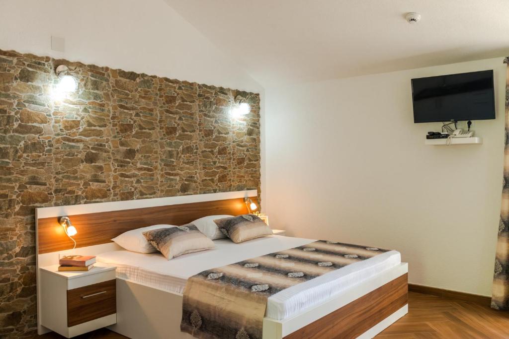 Posteľ alebo postele v izbe v ubytovaní Apartments Stella del Mare